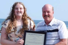 Annabelle Rayson (left) is awarded with the A.W. Campbell Memorial Scholarship by St. Clair Region Conservation Authority Chair, Pat Brown (right).