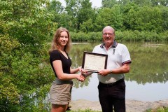 Brynn Dugdale (left) is awarded with the Tony Stranak Conservation Scholarship by St. Clair Region Conservation Authority Chair, Pat Brown (right).