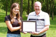 Olivia Grubb (left) is awarded with the A.W. Campbell Memorial Scholarship by St. Clair Region Conservation Authority Chair, Pat Brown (right).