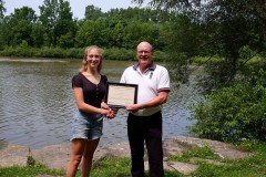 Rebecca Adema (left) is awarded with the Mary Jo Arnold Conservation Scholarship by St. Clair Region Conservation Authority Chair, Pat Brown (right).